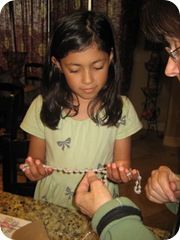 nina giving glass rosary