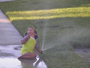 summer gio with sprinkler