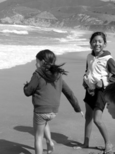 littles running from the waves