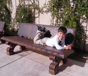 papi on a bench before mass