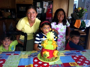 8.25.12 sweetie and siblings with cake