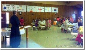 9.1.12 Fr. Stinson talking to the girls about hospitality and blessing